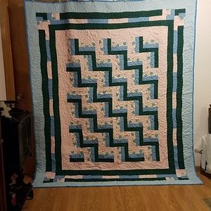 Hand made quilt blue,pink. and green